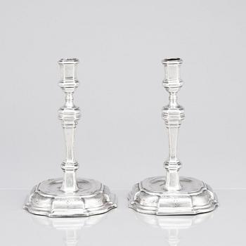 A pair of Swedish early 18th century silver candlesticks, mark of Petter Ersson Lund, Stockholm 1727.