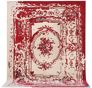 An oriental carpet, c. 300 x 248 cm.