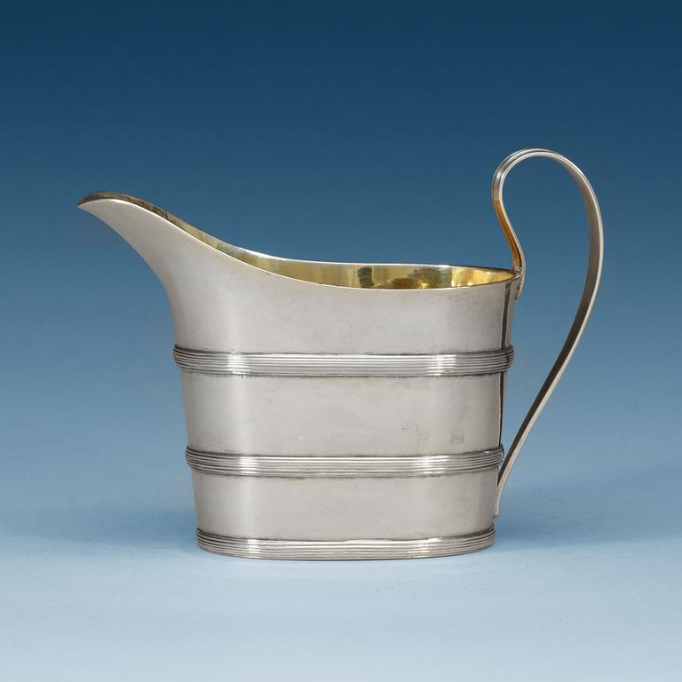 A Swedish early 19th century parcel-gilt cream-jug, makers mark of Stephan Westerstråhle, Stockholm 1807.