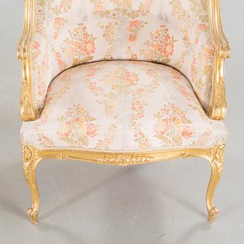 A pair of rococo style bergères, late 19th century.