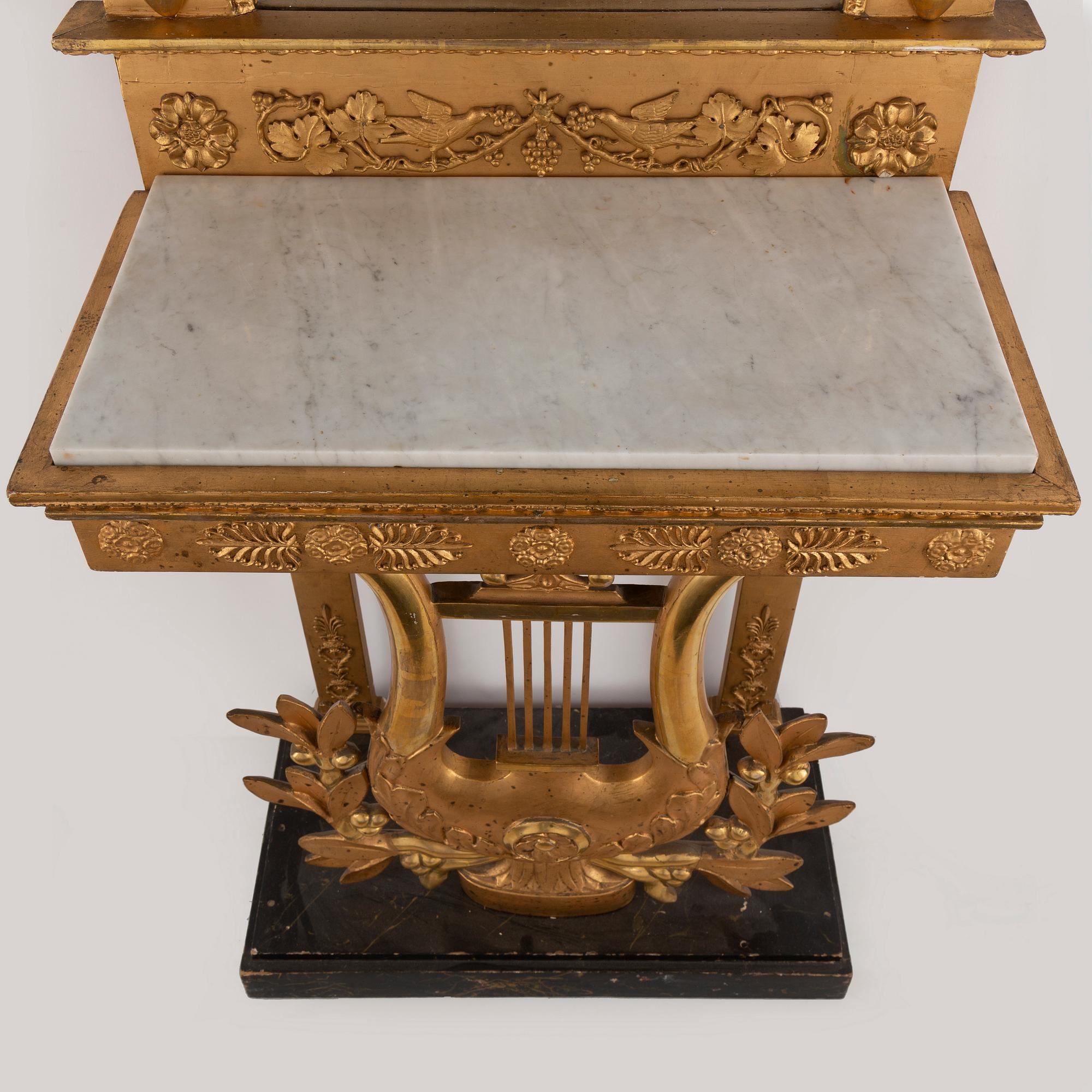 A Swedish mirror and console table, Empire, first half of the 19th century.