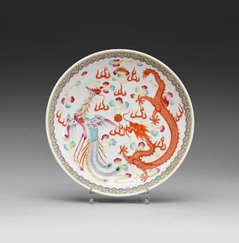 396. A phenix and dragon famille rose dish, Qing dynasty, with Guangxu six character mark and period (1875-1908).