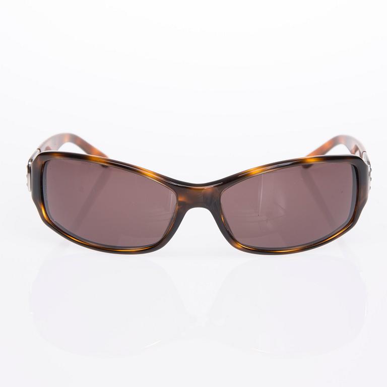 SOLGLASÖGON, Bulgari.