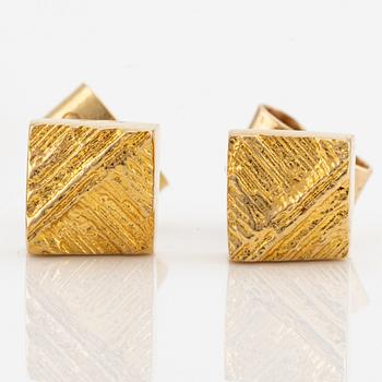 Lapponia, a bracelet and a pair of earrings, 18K gold.