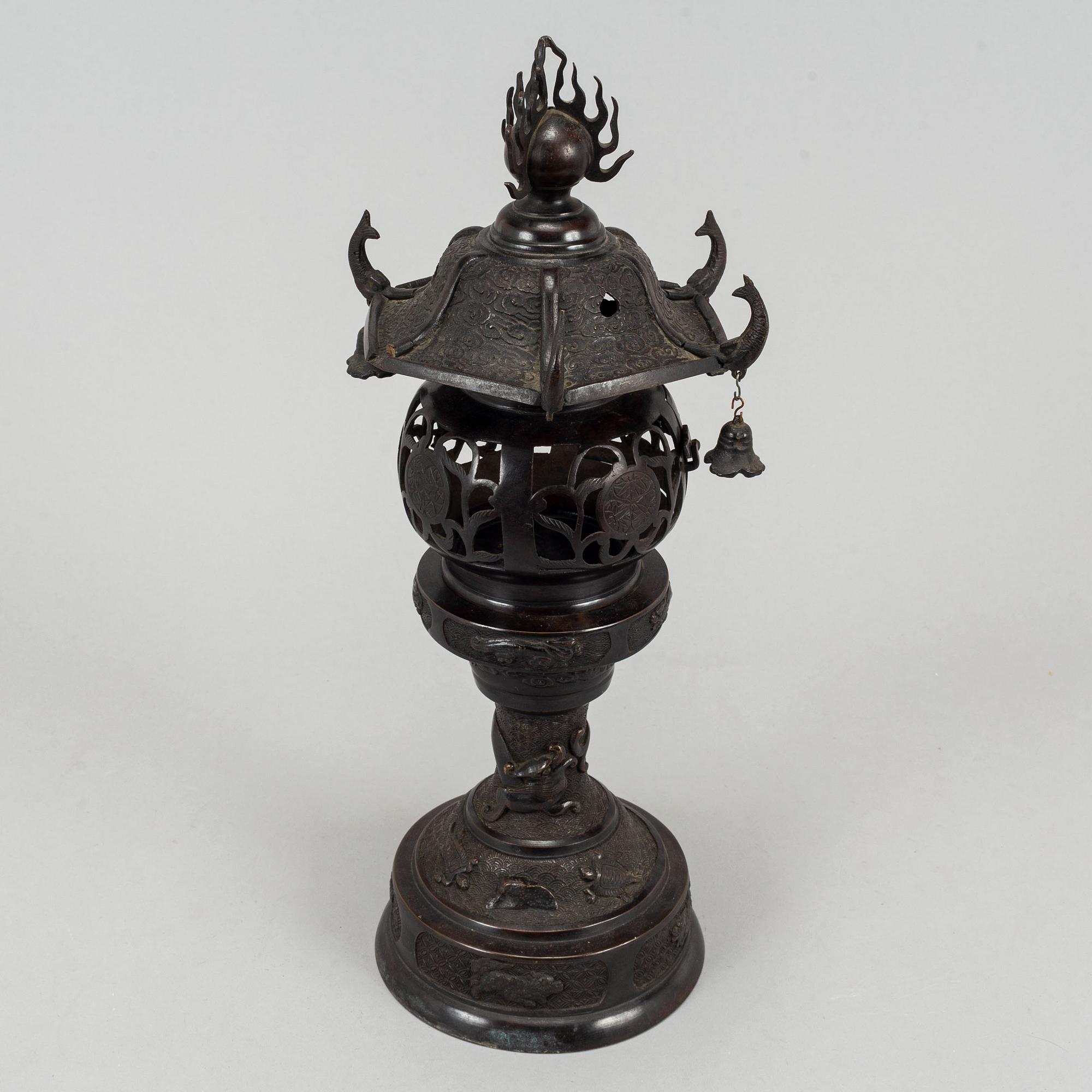 A 20th century Japanese bronze light holder pagoda.