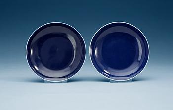 1417. A pair of blue glazed dishes, Qing dynasty, with Qianlongs seal mark.