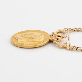 Medal, for diligence and integrity, gold, with a later chain in 18K gold.