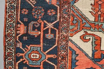 A carpet, an antique Heriz, ca 469,5-471 x 300-309,5 cm.