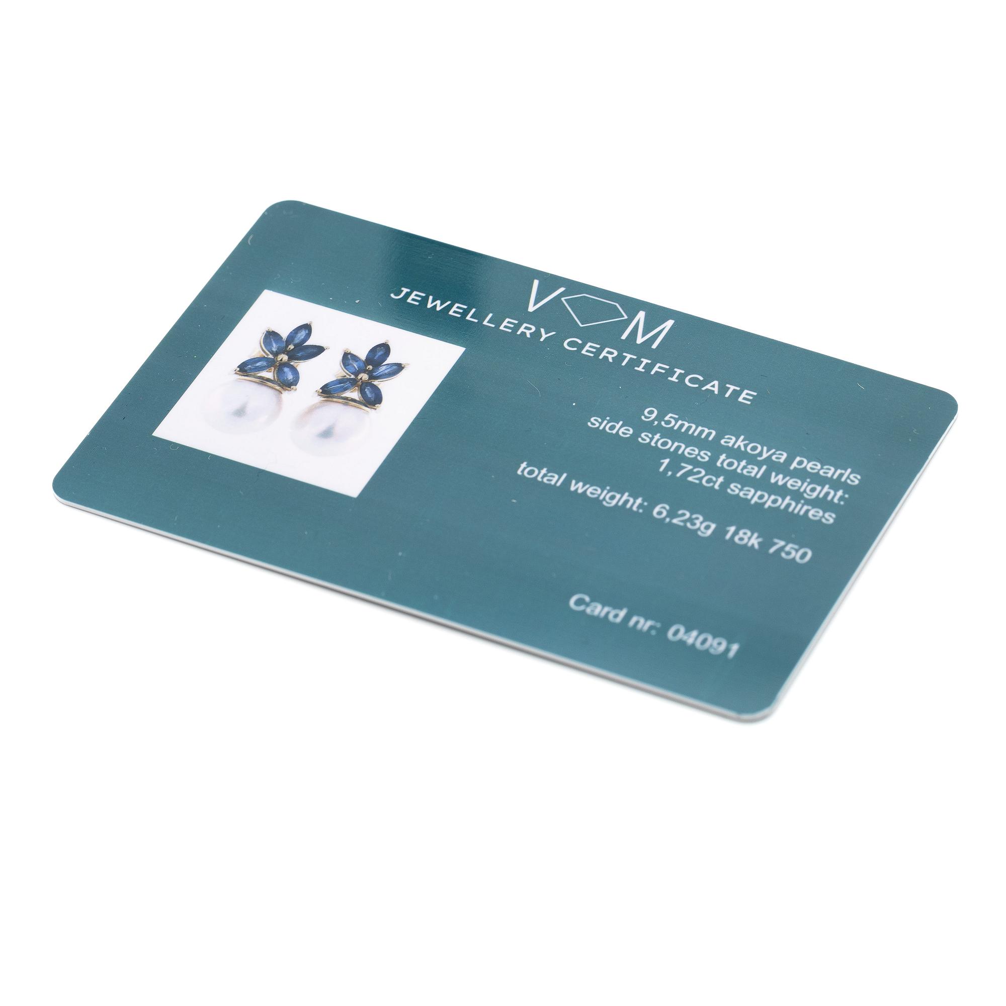 18K gold earrings with cultured Akoya pearls and navette-cut sapphires.