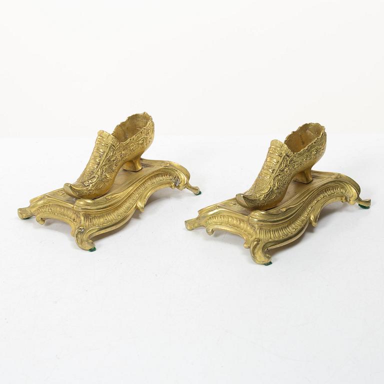 Table ornaments in the form of shoes, a pair, fire-gilt bronze, probably France, 19th century.