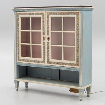 A Gustavian style vitrine cabinet, early 20th century.