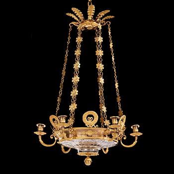 122. An Empire cut glass and gilded bronze six-light hanging lamp in the manner of Alexandre Guérin.