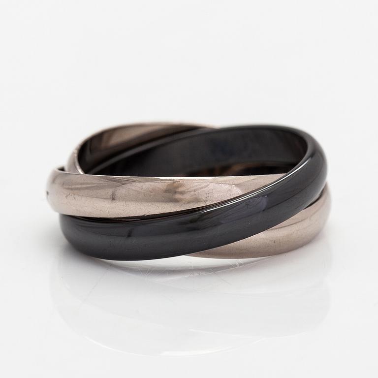 Cartier, An 18K white gold a ceramic ring "Trinity". Marked Cartier, JQV623.