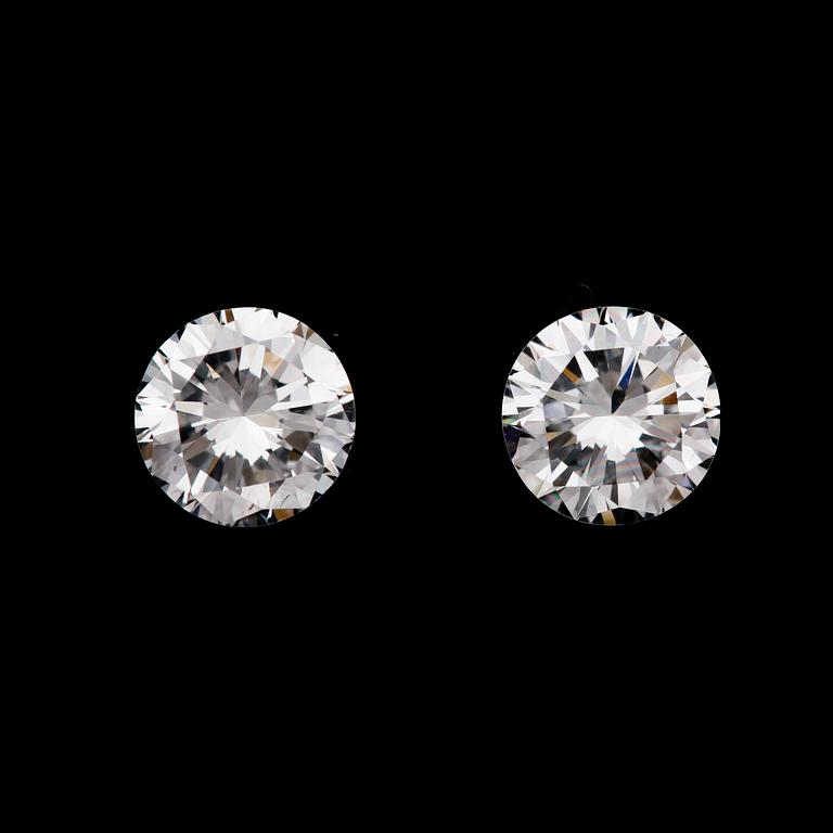 BRILLIANT CUT DIAMONDS, 2 loose stones, 0.62, 0.59 cts.