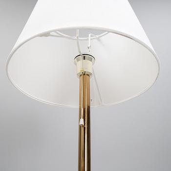 Bergboms, a pair of model 'G-024' brass floor lamps. Second half of the 20th century.
