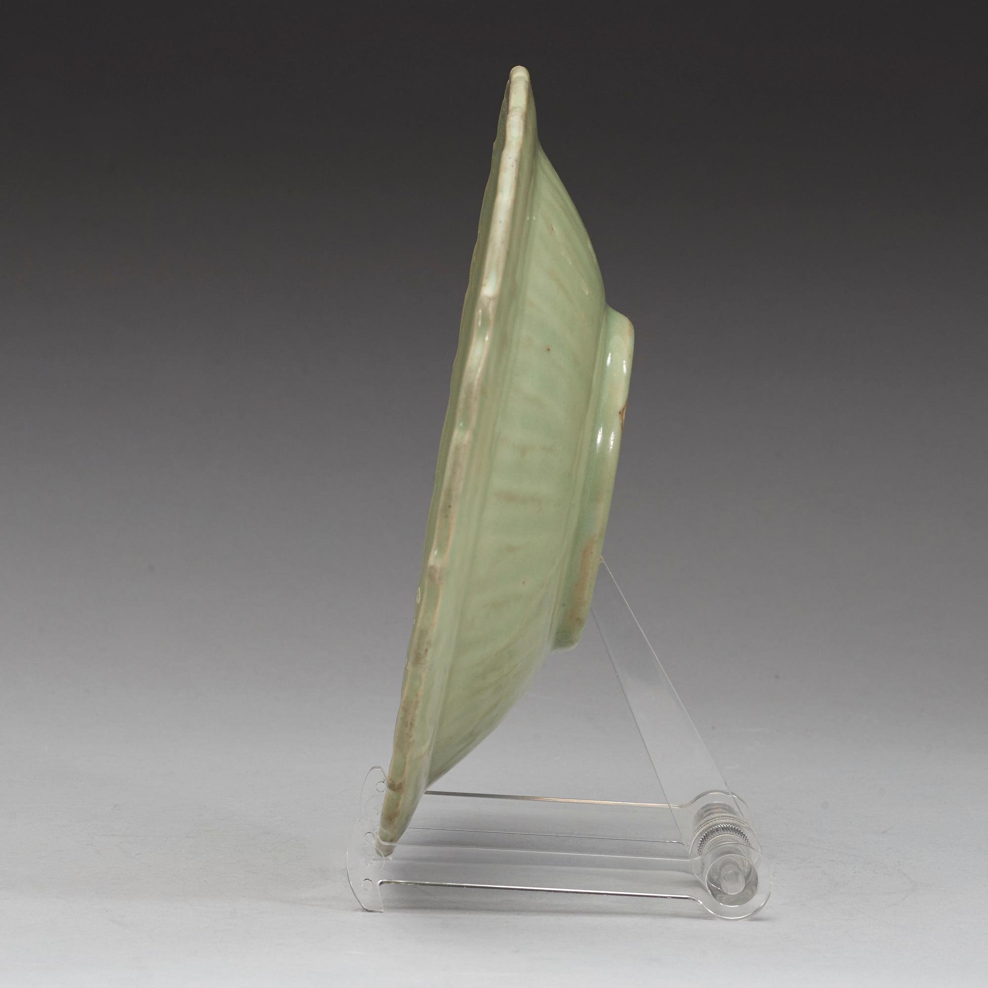 A celadon glazed dish, Ming dynasty (1368-1644).