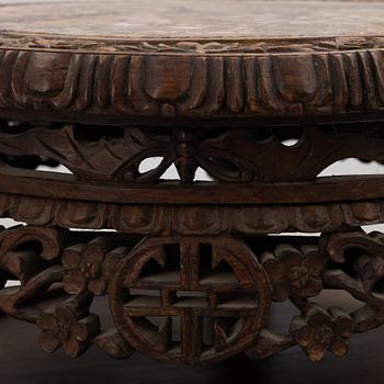 A Chinese hardwood table, around 1900.