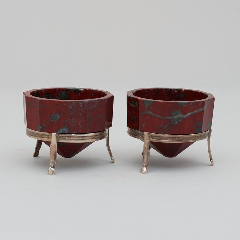 A pair of Swedish early 19th century iron-silicon salts. Silver stands with maker's mark J. H. Leffler, Falun 1817.