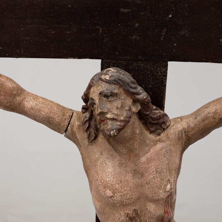 A 17TH CENTURY WOODEN CRUCIFIX, baroque.