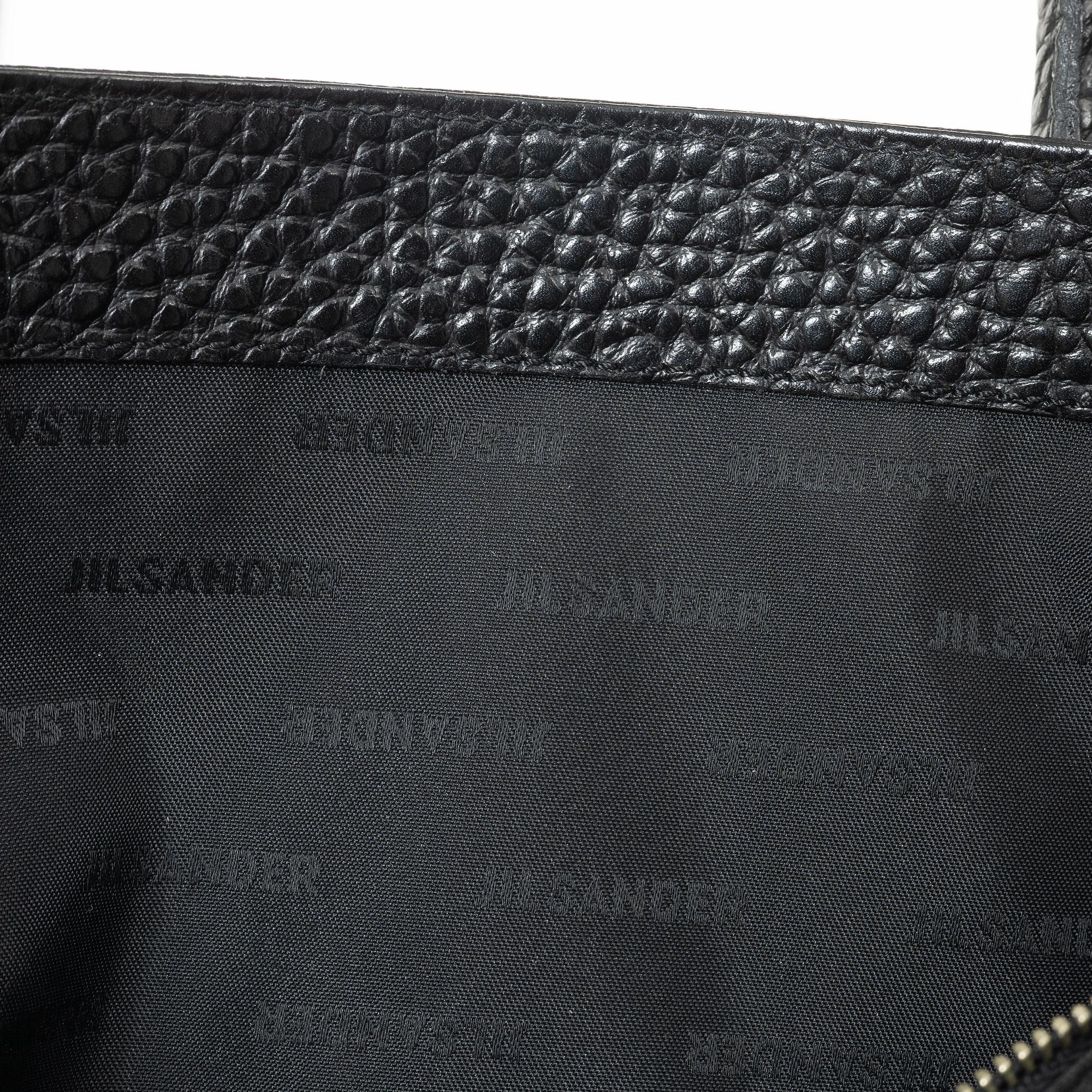 Jil Sander, A black leather bag.