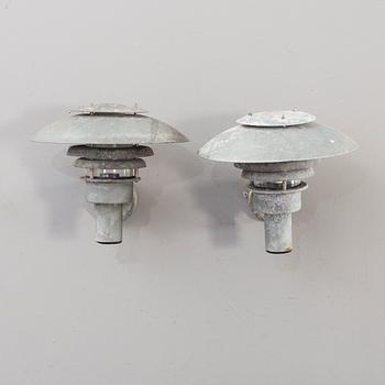 A pair of late 20th century outdoor lights.