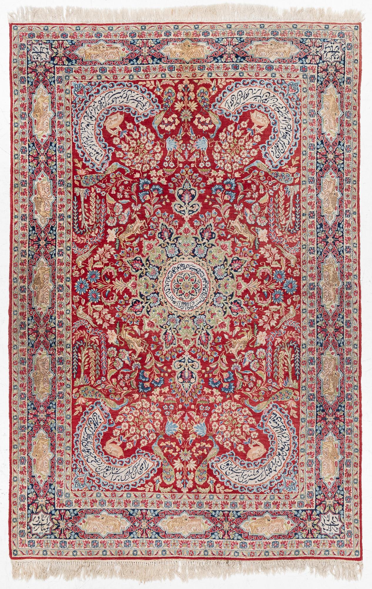 A semi-antique Kirman carpet, c. 275 x 180 cm.