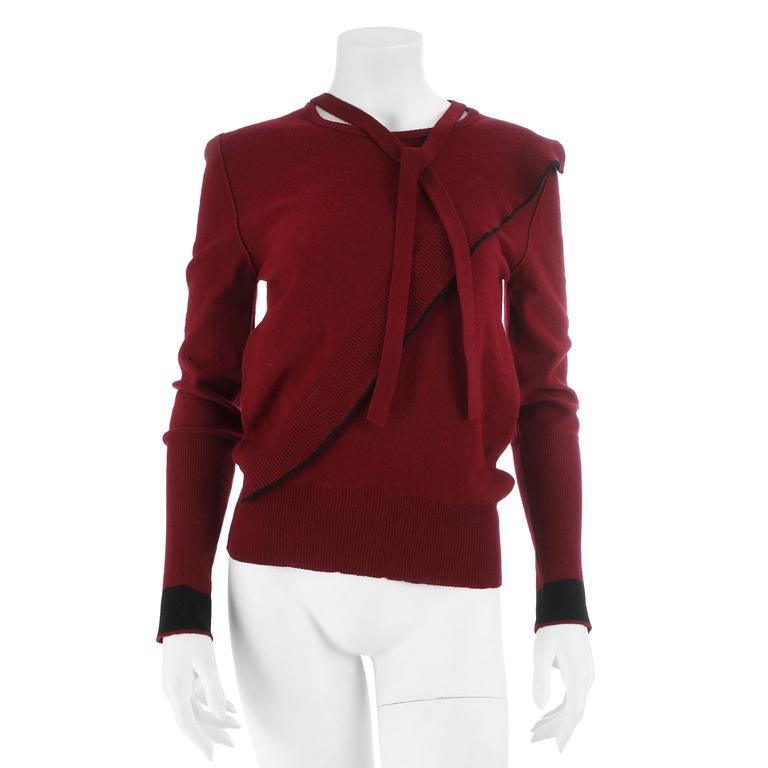 SONIA RYKIEL, a burgundy red wool sweater.