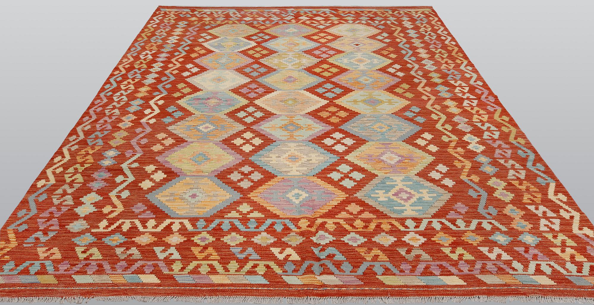 A kilim carpet, ca 292 x 213 cm.