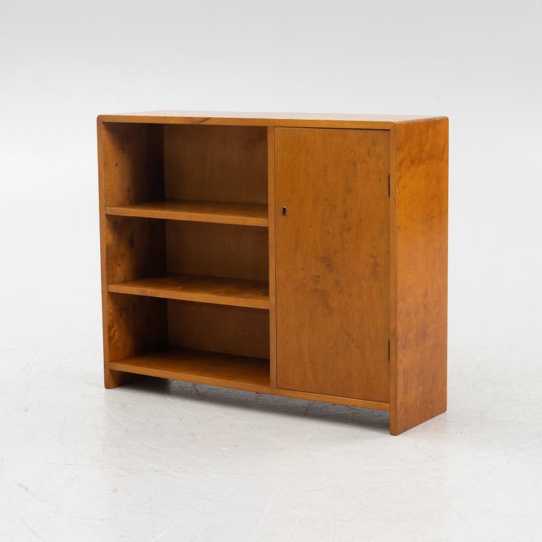 A birch wood book case with cabinet, 1930s.