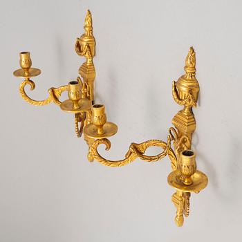 A pair of wall sconces, Louis XVI style, early 20th century.