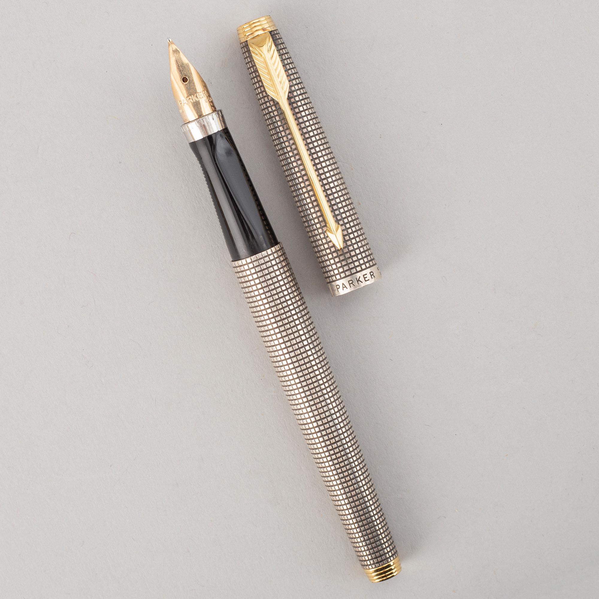 PARKER, a sterling silver fountain pen.