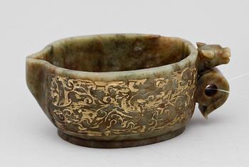 An archaistic carved and gilded vessel, Qing dynasty.