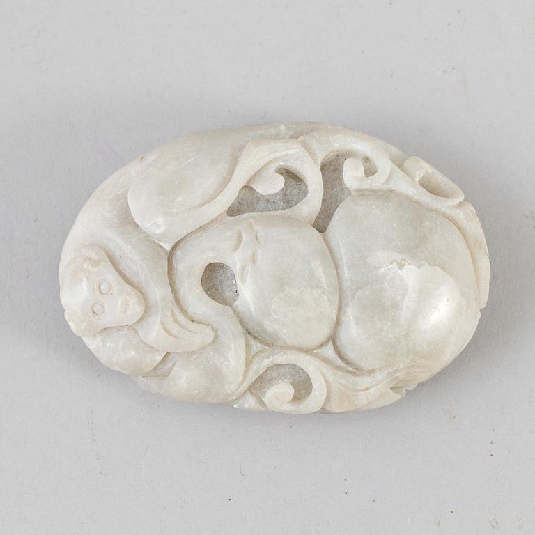 A Chinese carved sculpture of a monkey , louts and calebass fruit. 20th Century.