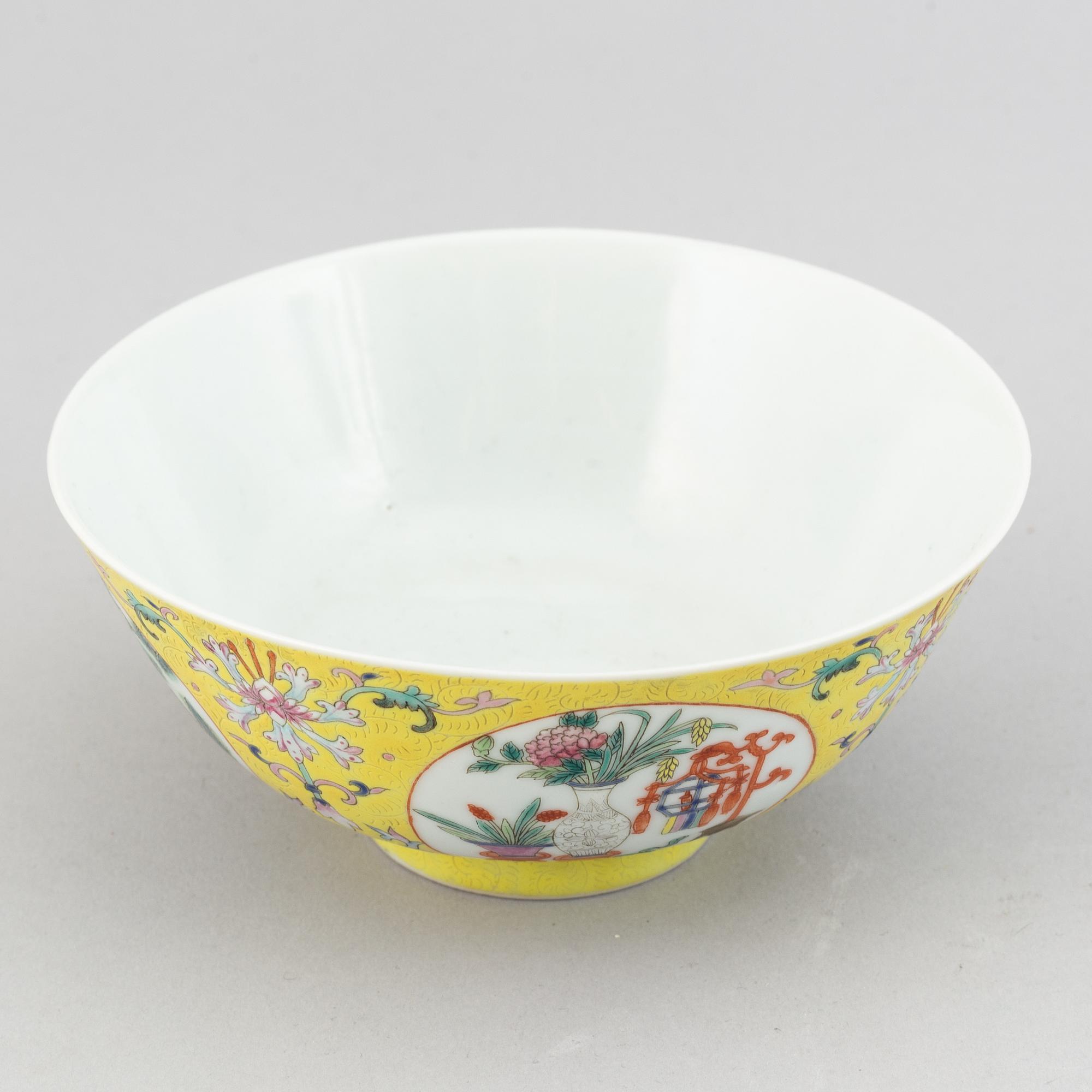 A famille rose  yellow ground bowl, China, 20th Century.
