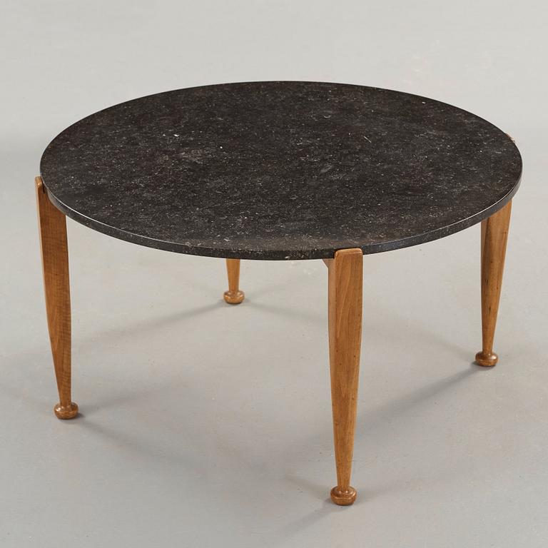 Josef Frank, a black marble top table, model 960, walnut base, Svenskt Tenn, 1950's.