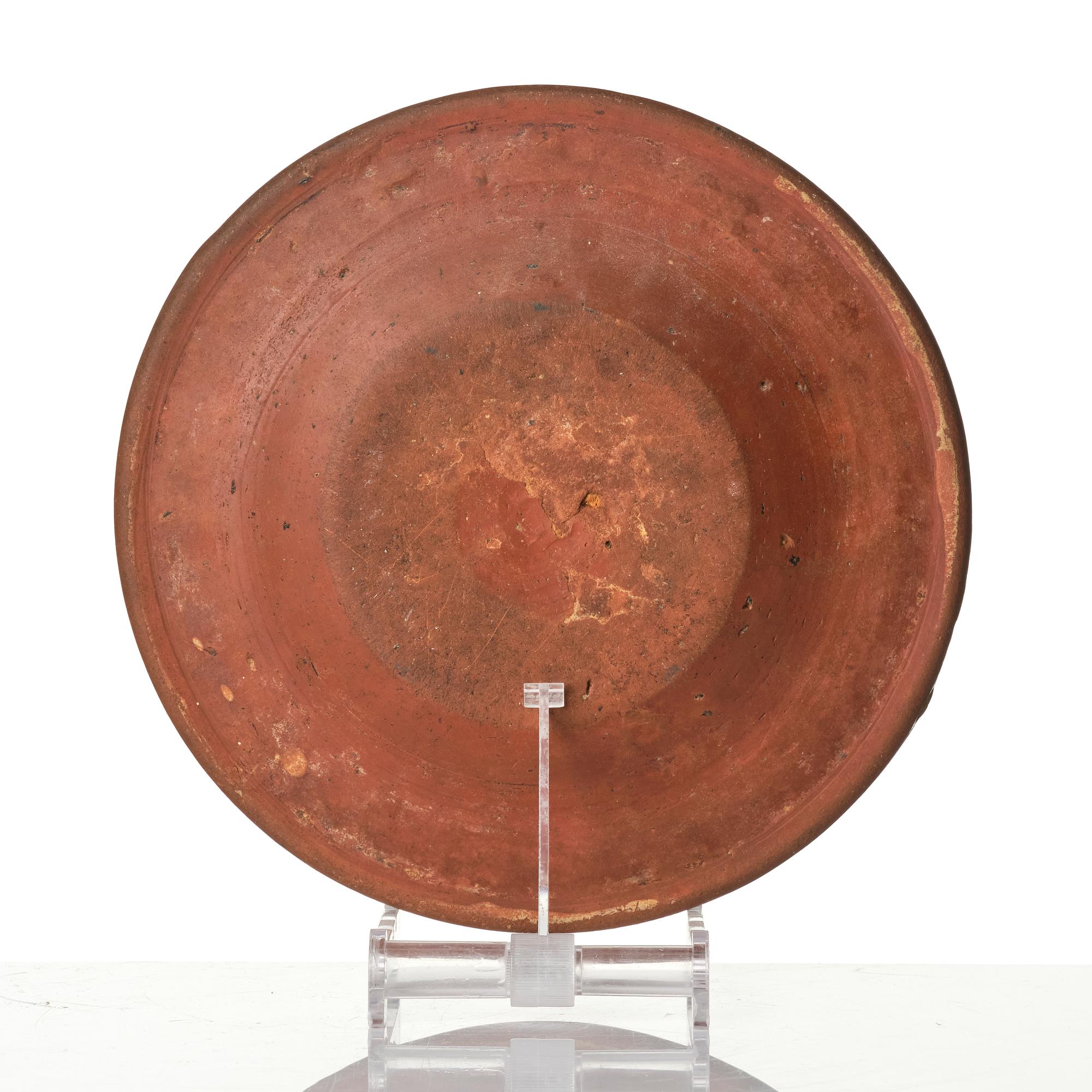 An earthenware dish, dated 1792.