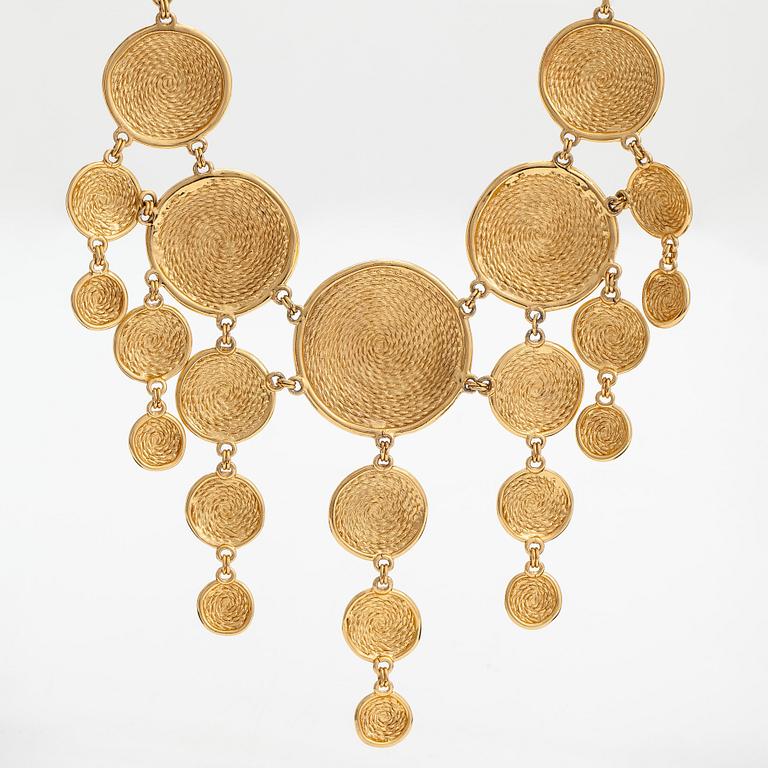 Dior, a necklace and a pair o earrings, both gold coloured metal. Marked  Chr. Dior and Chr. Dior Germany. 1980s.