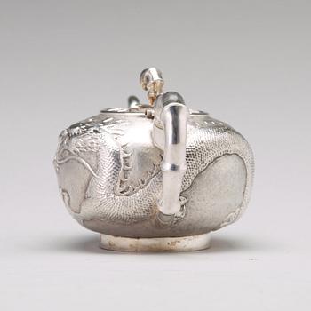 A Chinese four piece silver tea set, Luen Wo, Shanghai, 1875-1925.