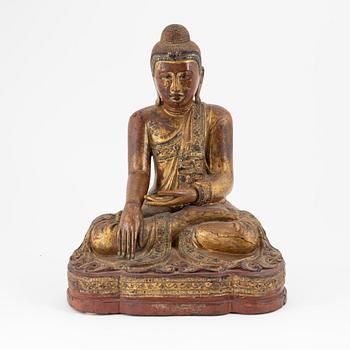 A seated wood Buddha, Thailand, 20th century.