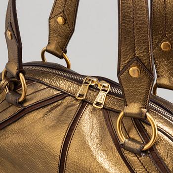 YVES SAINT LAURENT, a metallic bag.
