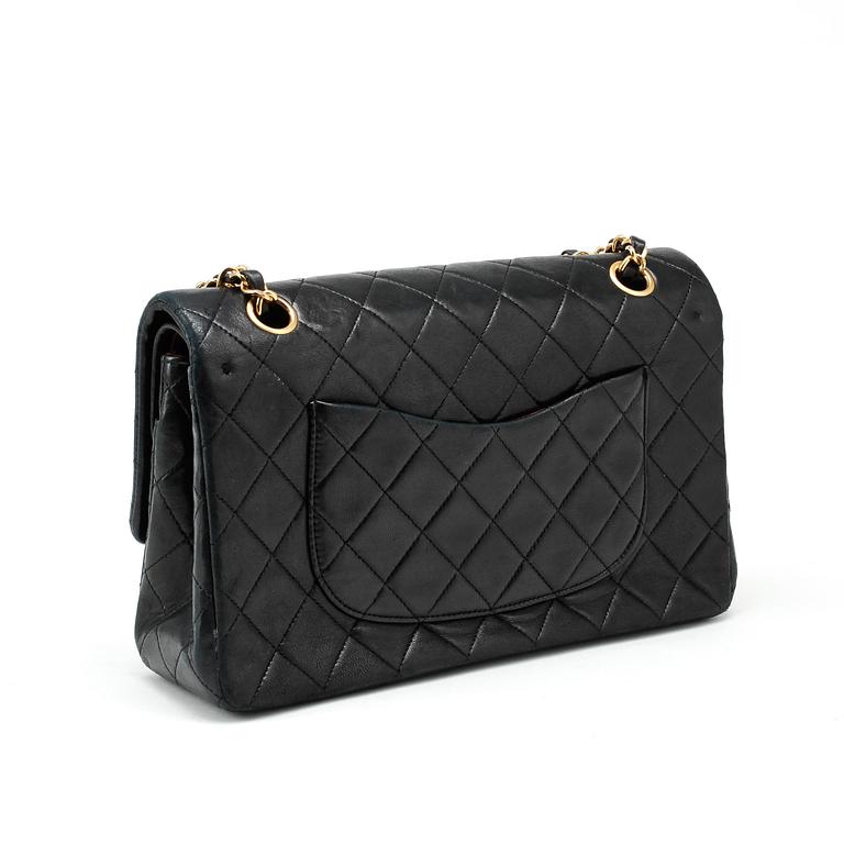 CHANEL, a quilted blue leather "Double Flap" shoulder bag.