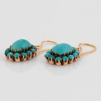 A pair of 18K and 9K gold earrings set with turquoises.