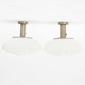 Harald Notini, a pair of ceiling lamps, model "11321", Arvid Böhlmarks Lampfabrik, 1940s.