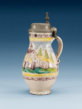 A German pewter mounted faience tankard, 18th Century.