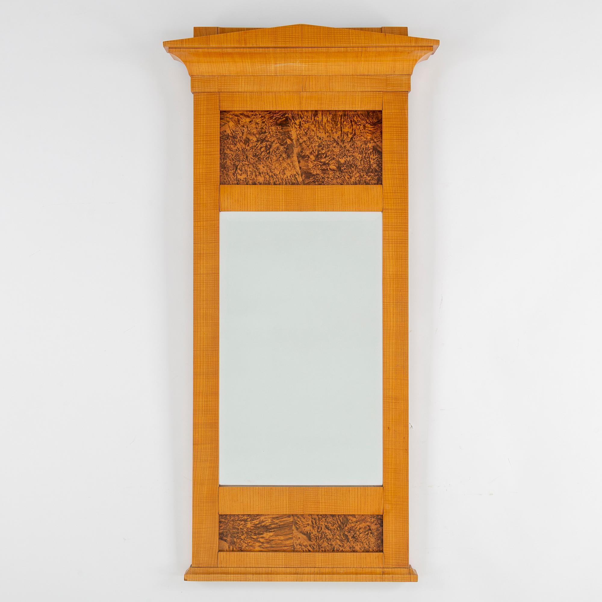 A 19th century birch mirror.