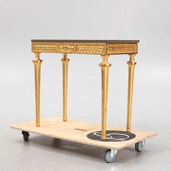 A console table with stone top.