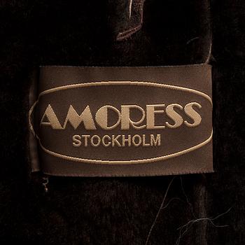A fur and leather jacket by Amoress, in size app 36.
