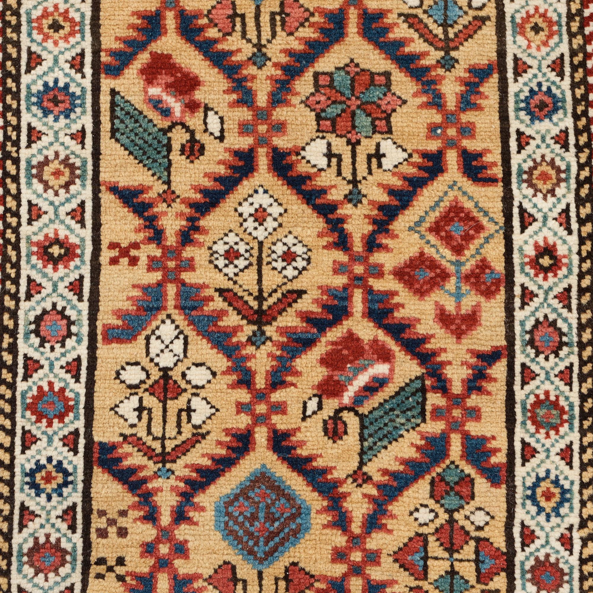 MATTO, an antique Kuba, ca 289,5 x 97 cm (as well as the ends with 1 cm light blue soumak).
