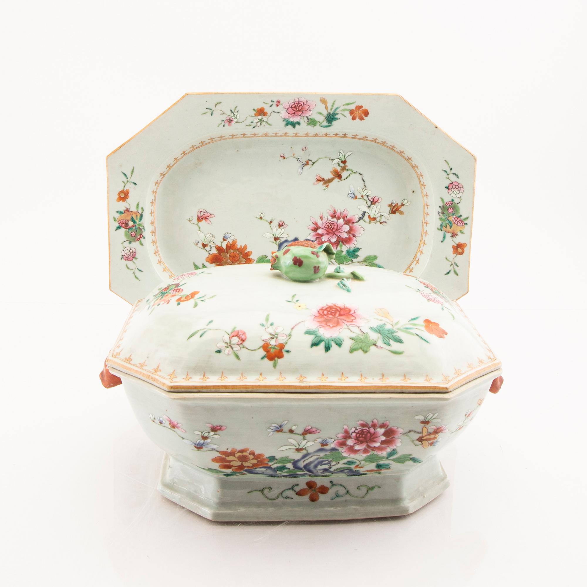 A Chinese famille rose tureen with cover and plate later part of the 18th century.