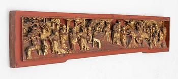 A carved wooden relief, China, late Qing dynasty, late 19th century.